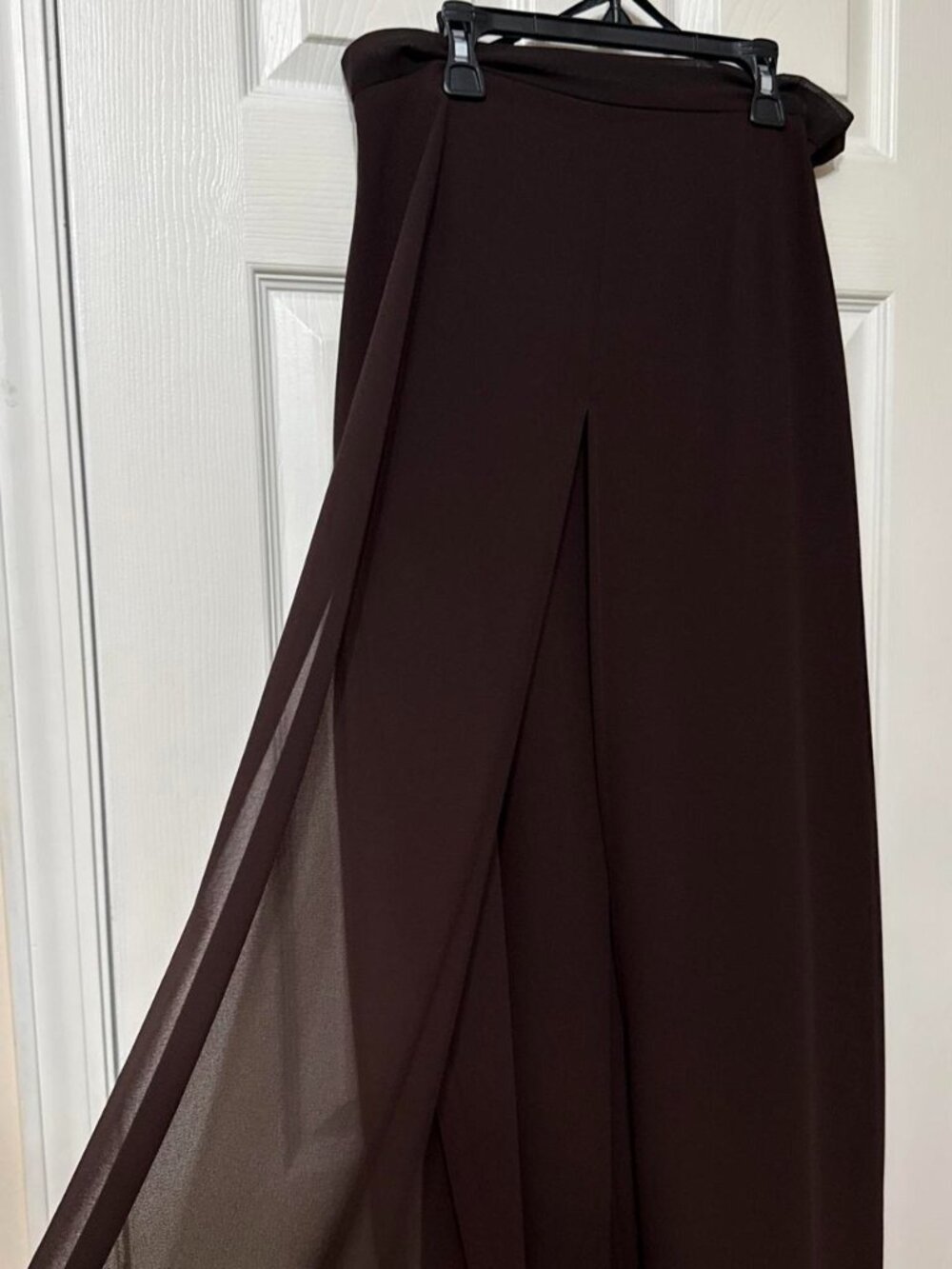 Dark brown flowey and drapey wide leg high rise pants.